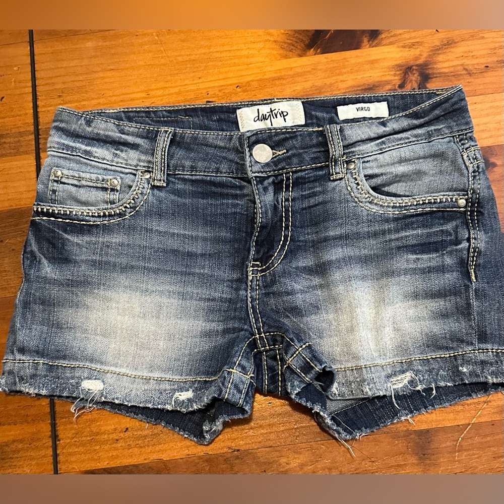 Daytrip jean shorts with lots of distress. Size 28. Super cute